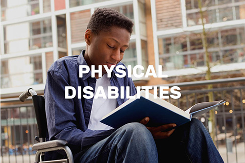 a boy in a wheelchair reading a book